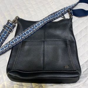 The Sak black leather messenger bag